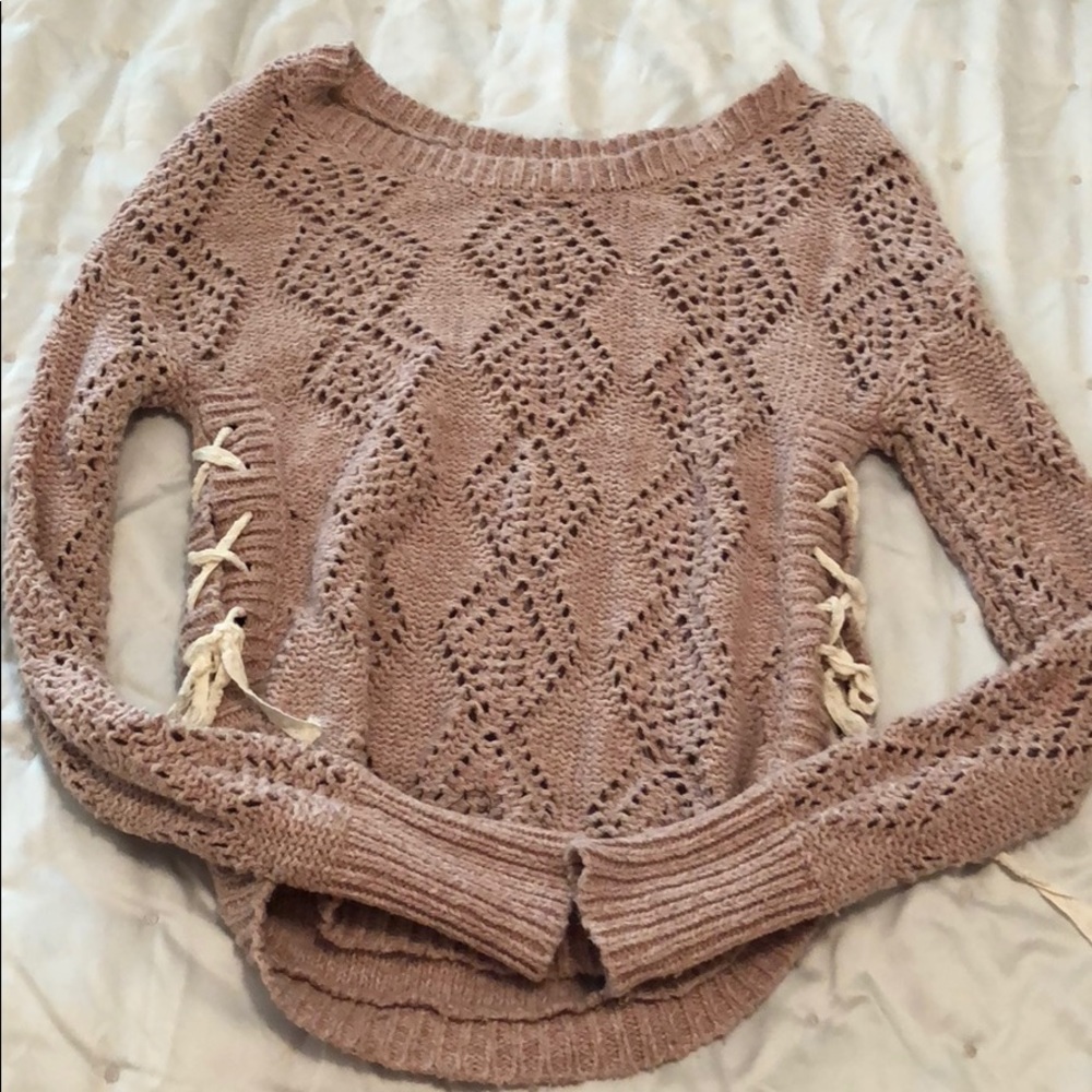 Pink lace-up sweater